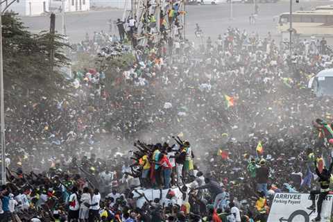 Watch thousands of jubilant fans give Senegal’s Afcon champions a hero’s welcome as Sadio Mane..