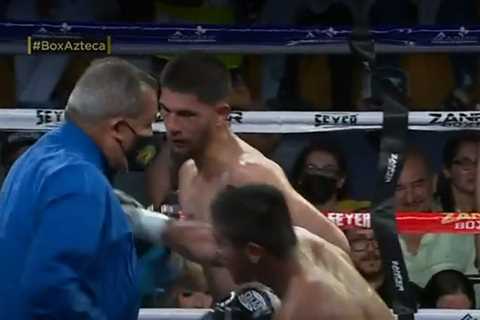 Boxing referee is stretchered out of ring after being KO’d by brutal punch from fighter in worrying ..