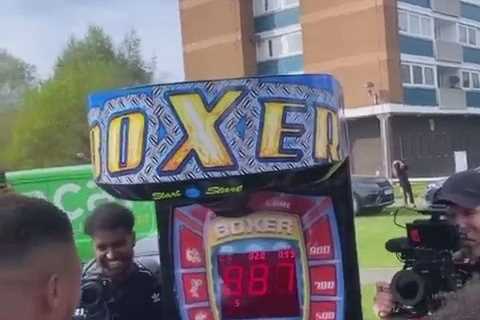 Watch Anthony Joshua show off his explosive punching power on arcade boxing machine during Easter..