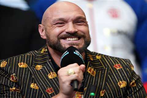 Tyson Fury holds back dad John as he clashes with Dillian Whyte’s team during face-off ahead of..