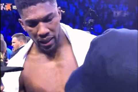 ‘F*** that s***’ – Watch Anthony Joshua’s fuming reaction to Lomachenko as Ukrainian consoles him..