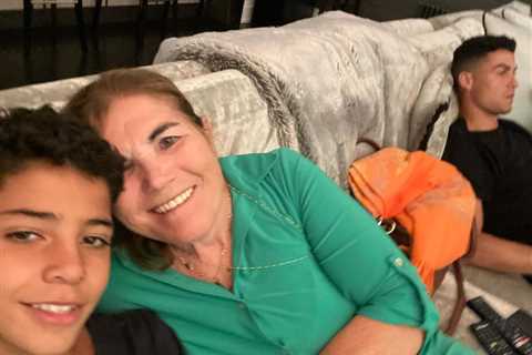 Cristiano Ronaldo looks far from happy as mum posts pic of Man Utd star on sofa ‘with her boys’..