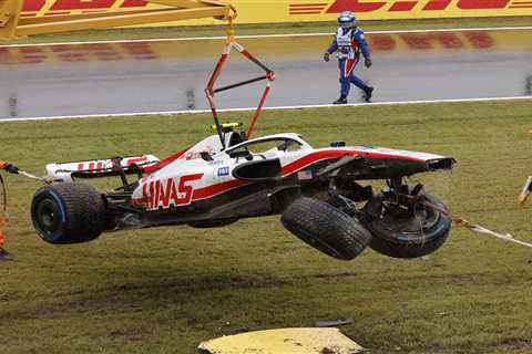 Watch as Mick Schumacher CRASHES out of Japanese GP practice and destroys car as torrential rain..