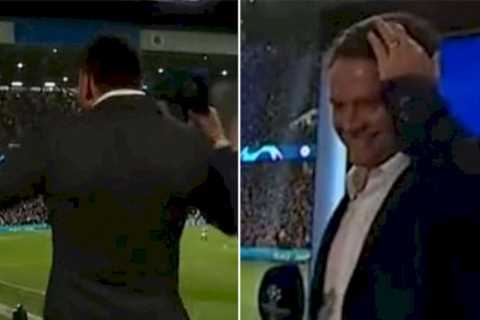 Rio Ferdinand goes mad celebrating Rangers goal vs Liverpool in front of Michael Owen