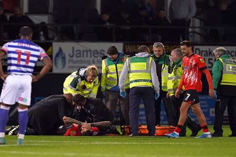 Luton star Sonny Bradley involved in sickening collision and given oxygen before being stretchered..