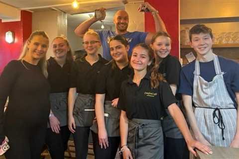 Tyson Fury and Molly Mae Hague pose for pictures with fans after visiting local cafe for fry-up