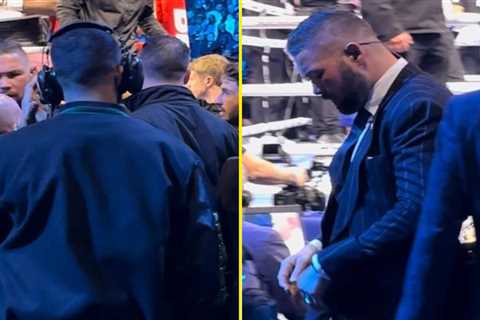 Ringside footage shows Tony Bellew escorted from fiery altercation with Jermaine Franklin’s team..