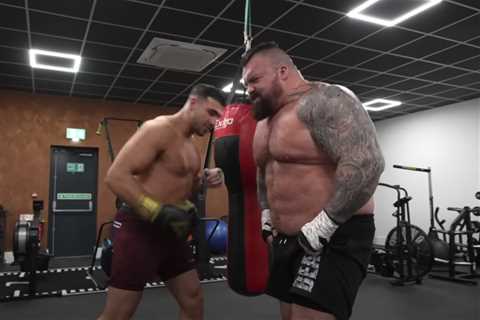 Watch Tommy Fury punch former world’s strongest man Eddie Hall so hard he nearly VOMITS