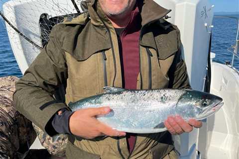 Former French Open winner looks unrecognisable while proudly holding a huge fish with stubbly grin