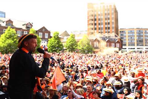 Luton Town fans celebrate team’s Premier League promotion with open top bus parade