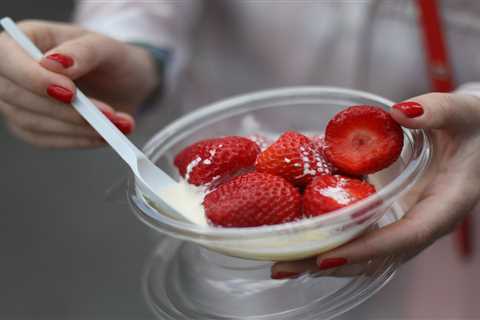 Why do they sell strawberries and cream at Wimbledon and how much does it cost?