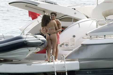 MotoGP star Marc Marquez can’t keep his hands off bikini-clad model girlfriend on yacht in Majorca