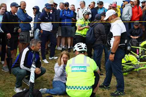 Medics rush to help stricken fan as second supporter is hit by ball at The Open after stray Zach..