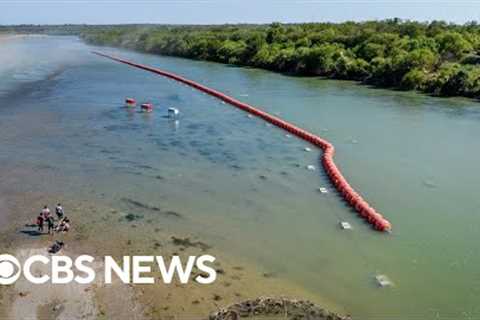 Justice Department sues Texas over floating border barrier in Rio Grande