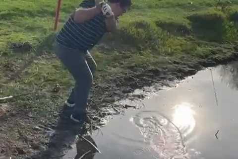 Major TV star suffers epic fail as he splashes himself then falls into muddy lake during James..