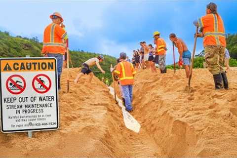 CITY WORKERS CONNECT RIVER TO OCEAN